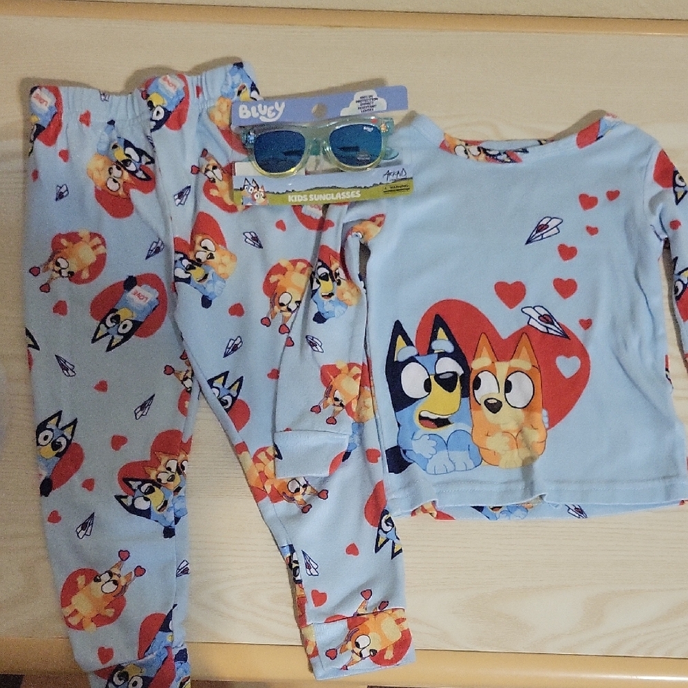 Toddler Boy Bluey PJs And A Pair Of Bluey Sunglasses